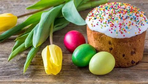 Easter egg panettone bread cake background Happy easter spring holiday tulip Stock Photos