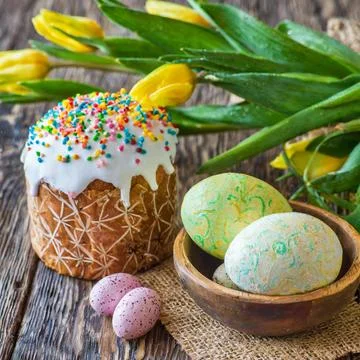 Easter egg panettone bread cake background Happy easter spring holiday tulip Stock Photos