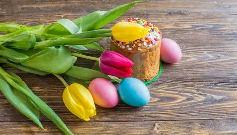 Easter egg panettone bread cake background Happy easter spring holiday tulip Stock Photos