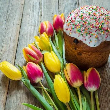 Easter egg panettone bread cake background Happy easter spring holiday tulip Stock Photos