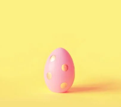Easter egg on pastel yellow background. Happy Easter concept. Minimal concept Foto stock