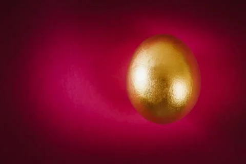 Easter egg on a purple background Stock Photos