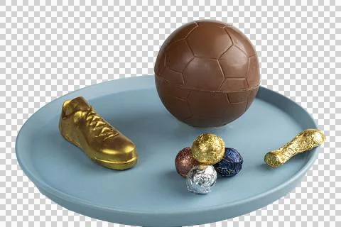 Easter egg in the shape of a soccer ball filled with small assorted chocola.. Stock Photos