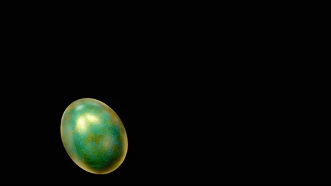 Easter egg spinning on an isolated black background Video stock 154315105
