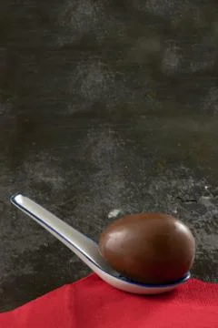 Easter egg in spoon Stock Photos