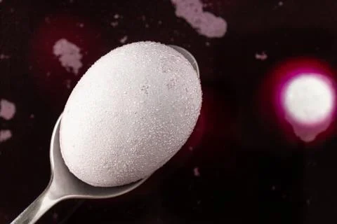 Easter egg on a spoon. Putting egg into the color. Happy easter Stock Photos