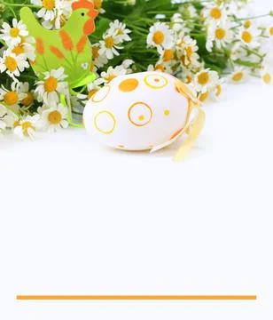 Easter egg on spring background daisy with blurred focus Stock Photos