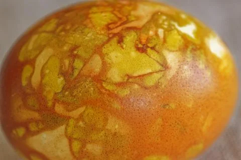 Easter egg stained using dried onion bulb epidermis Stock Photos