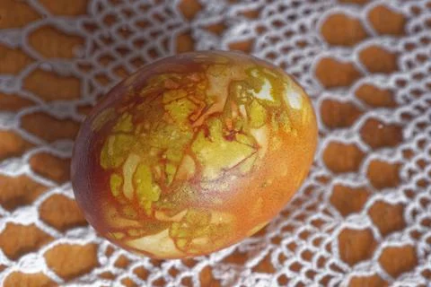 Easter egg stained using dried onion bulb epidermis Stock Photos