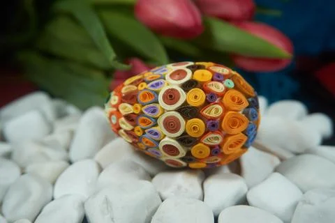 Easter egg on the surface of white stones Stock Photos