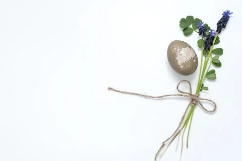 Easter egg, twine and mouse hyacinth on a white background. easter spring f.. Stock Photos