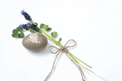 Easter egg, twine and mouse hyacinth on a white background. easter spring f.. Stock Photos