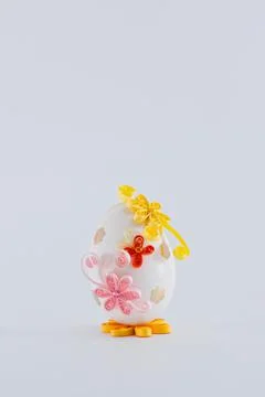 Easter egg on a white background decorated with quilling Stock Photos