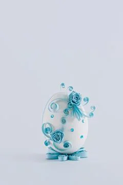 Easter egg on a white background decorated with quilling Stock Photos