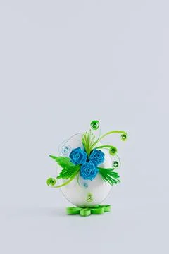 Easter egg on a white background decorated with quilling Stock Photos