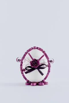 Easter egg on a white background decorated with quilling Stock Photos