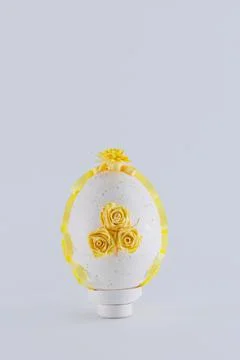 Easter egg on a white background decorated with quilling Stock Photos