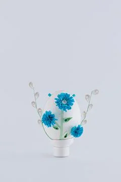 Easter egg on a white background decorated with quilling Stock Photos