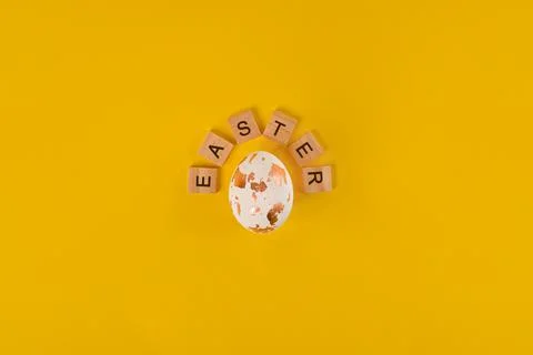 Easter egg on a yellow background. Stock Photos