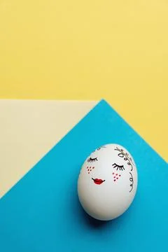 Easter egg on yellow-blue background Foto stock