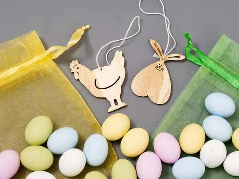 Easter eggs and bunny decorations on gray background Stock Photos