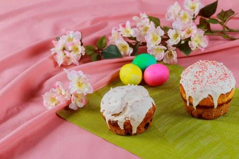 Easter eggs and cake on the bright background Stock Photos