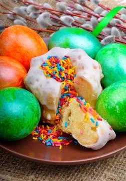 Easter eggs and cake on a plate Stock Photos