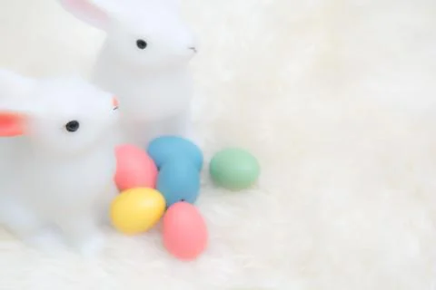 Easter eggs and Easter bunny on an Easter egg hunt Stock Photos