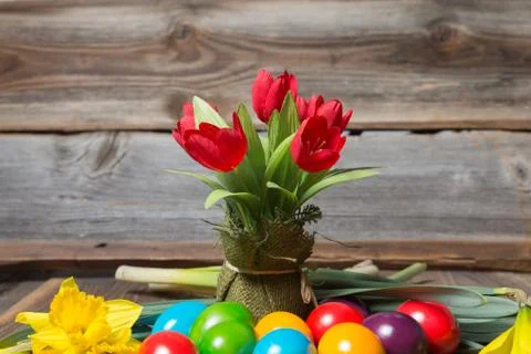 Easter eggs and flowers Stock Photos