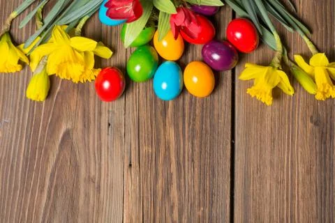 Easter eggs and flowers Stock Photos