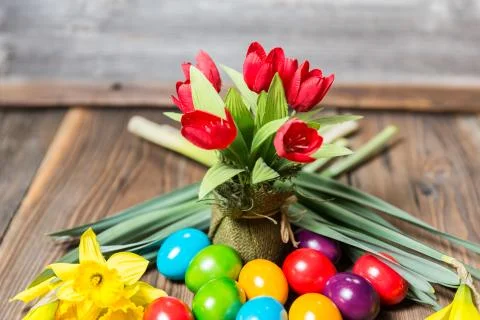 Easter eggs and flowers Stock Photos