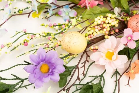 Easter eggs and flowers Stock Photos