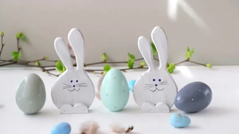 Easter eggs and funny bunnys on white table. Happy easter. Festive wooden Stock Footage 172609370