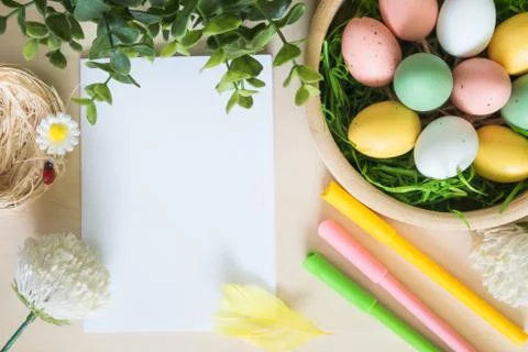Easter eggs and other decorations on wooden background Stock Photos