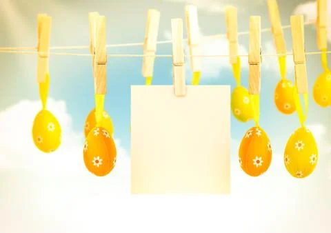 Easter eggs and paper for message hanging in the sky. Stock Illustration