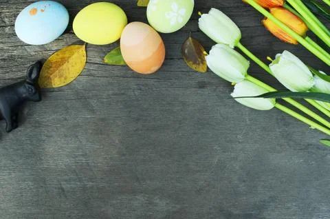 Easter eggs and rabbit with decoration on old wood backgrounds above frame .. Stock Photos