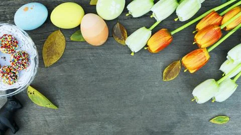 Easter eggs and rabbit with decoration on old wood backgrounds above with c.. Stock Photos