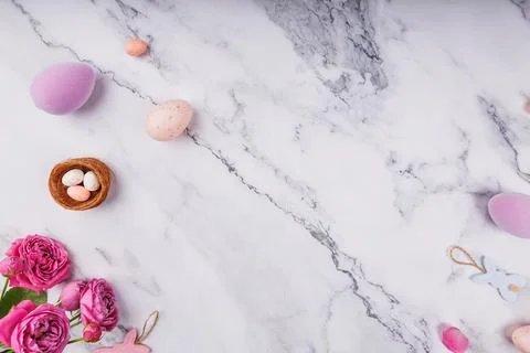 Easter Eggs and Roses on Marble Tabletop 스톡 사진