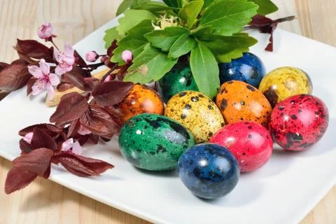 Easter eggs and spring flowers Stock Photos