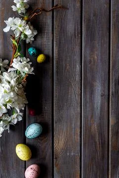 Easter eggs and spring flowers, top view Stock Photos
