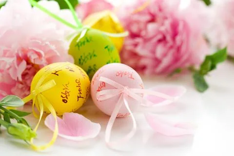 Easter eggs and spring flowers Stock Photos