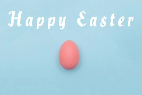 Easter eggs and text on pastel color background Stock Photos
