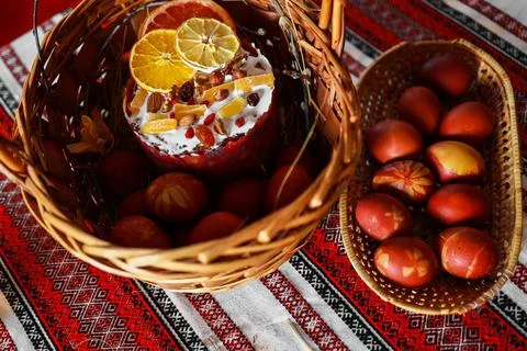 Easter eggs and traditional bread in a baskets Stock Photos