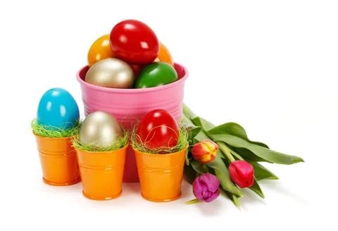 Easter eggs and tulips Stock Photos