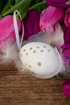 Easter eggs and tulips Stock Photos