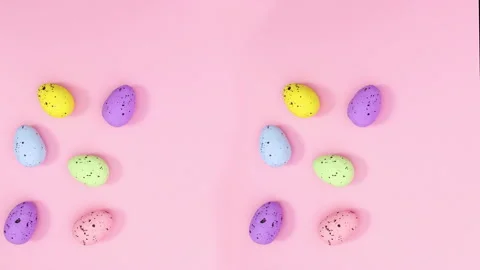 Easter eggs appear on paste pink theme. Stop motion Stock Footage 148775507