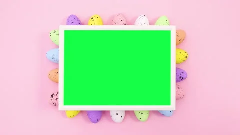 Easter eggs appear under the frame with green screen. Stop motion Stock Footage 148778120