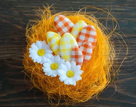 Easter eggs in an artificial nest Foto stock