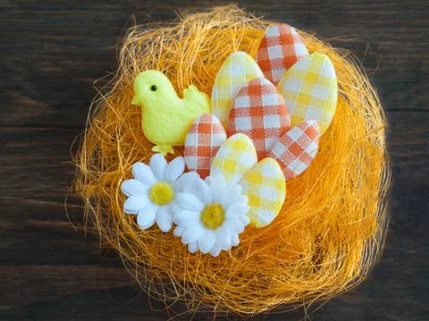 Easter eggs in an artificial nest Stock Photos