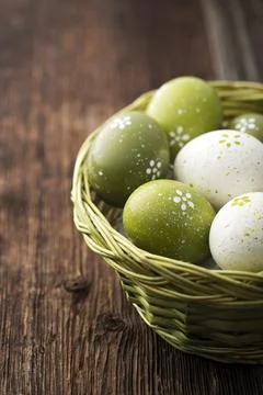Easter eggs in a basket close up shoot Stock Photos